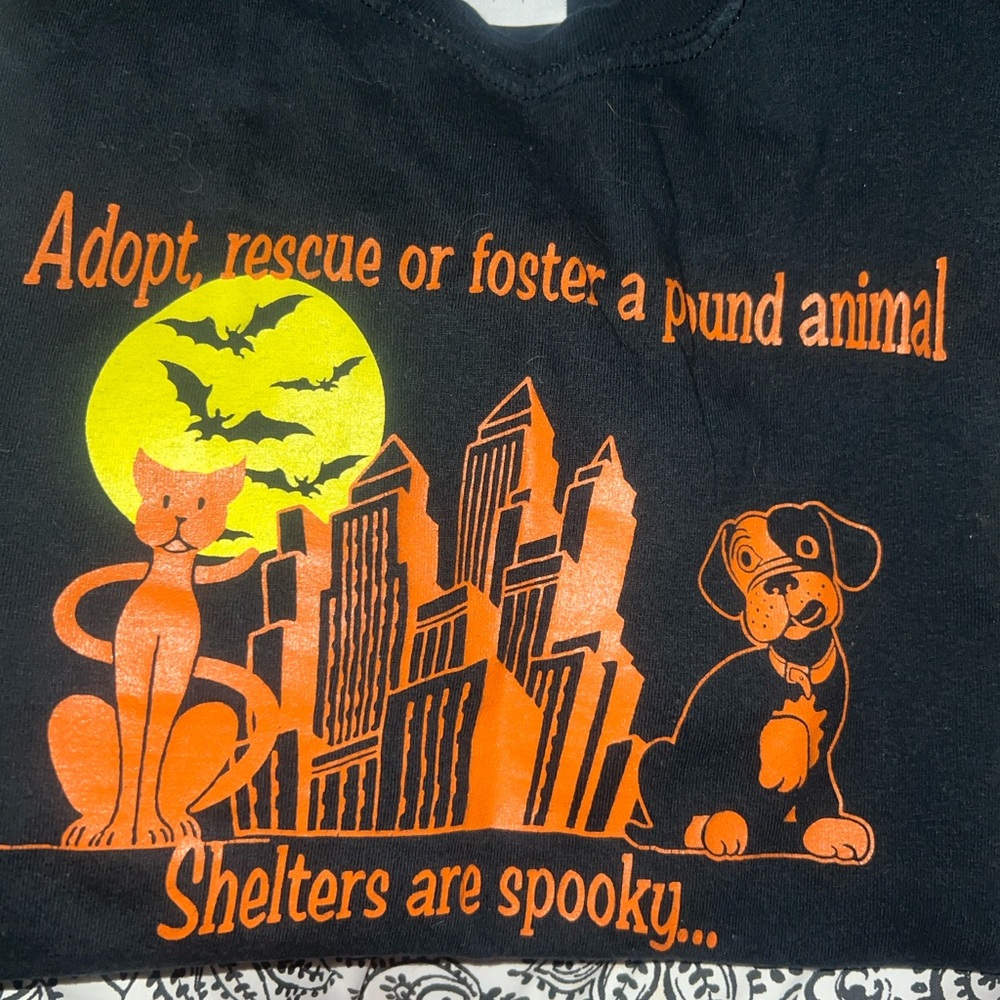 Black Graphic Tee with Orange and Yellow Design